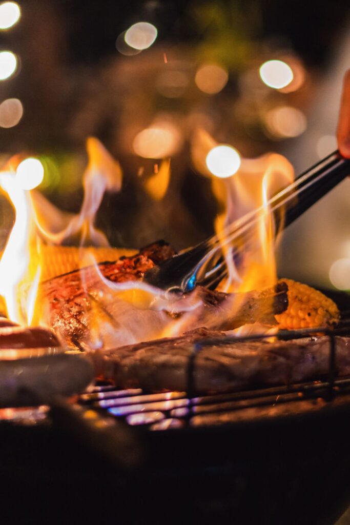 cooking on the grill while summer camping.